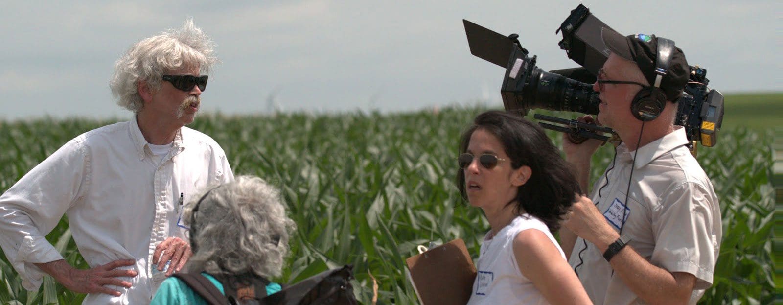 Storm Lake film crew in a corn field